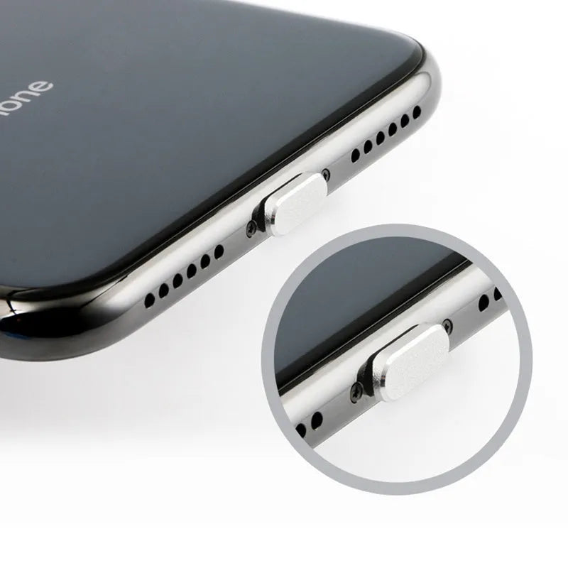 Aluminium alloy dust plug for iPhone charging port in a selection of colours including gold, silver, and rose gold.