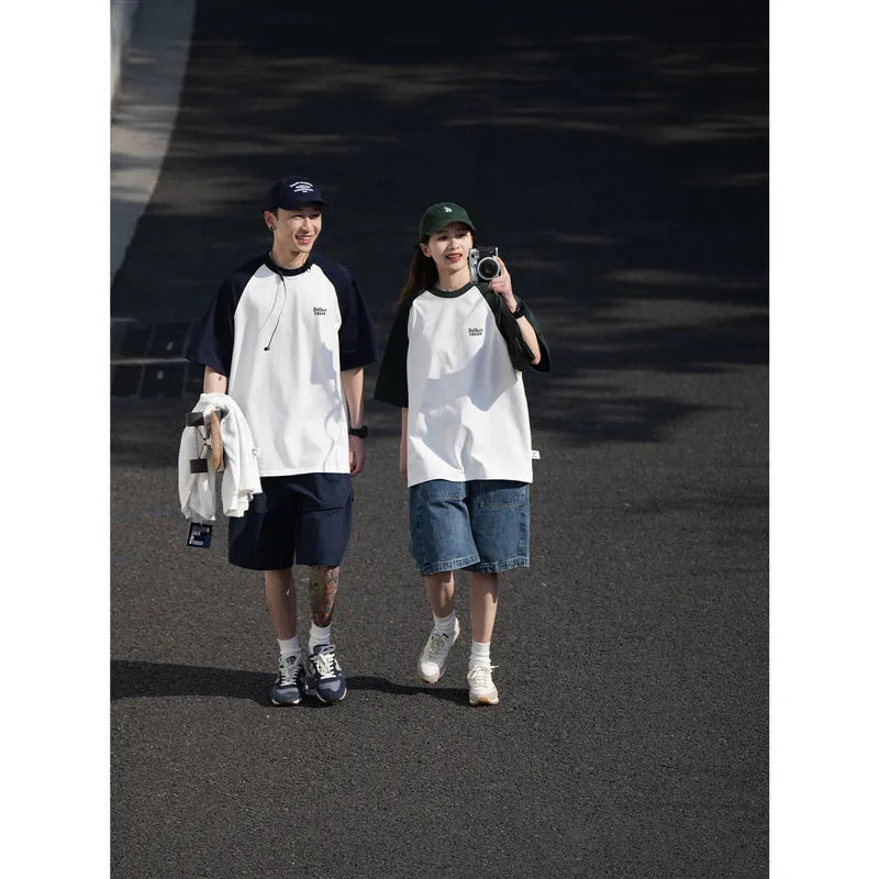 Men's blue Japanese raglan sleeve T-shirt with loose pullover fit on hanger