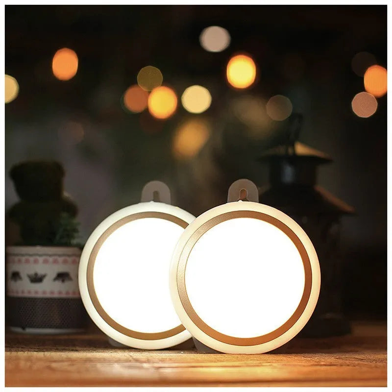 Circular smart motion sensor LED light with infrared sensor and five LEDs.