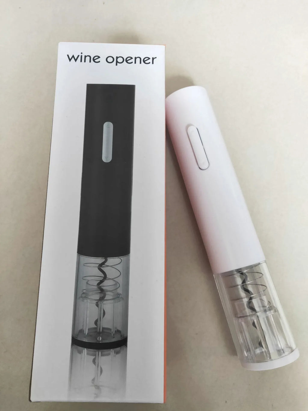 Automatic electric wine bottle opener with foil cutter in black, red, and white colour options.