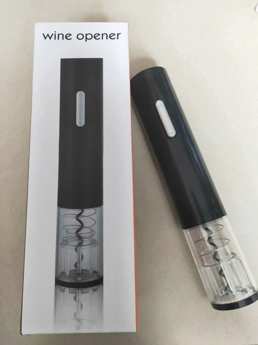 Automatic electric wine bottle opener with foil cutter in black, red, and white colour options.