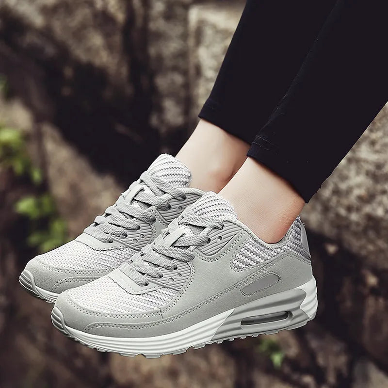 Women's low-heel casual shoes in beige orange, grey, and pink purple on a white background.