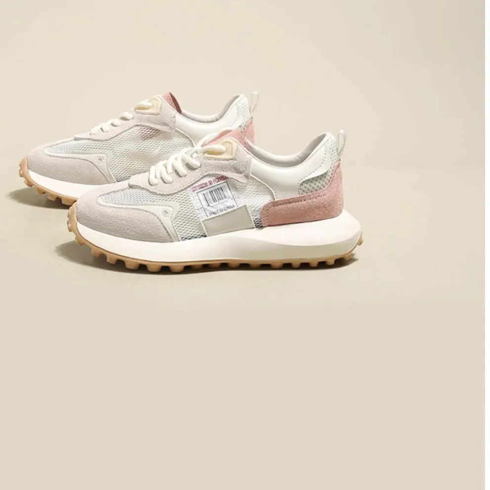 Women's grey and pink retro sneakers with low-top design and round toe
