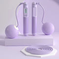 Skipping rope with ABS plastic handles and a ball bearing mechanism, shown in various colour options.