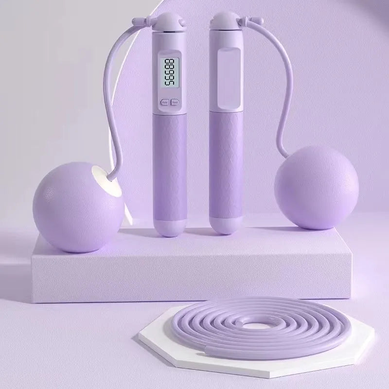 Skipping rope with ABS plastic handles and a ball bearing mechanism, shown in various colour options.
