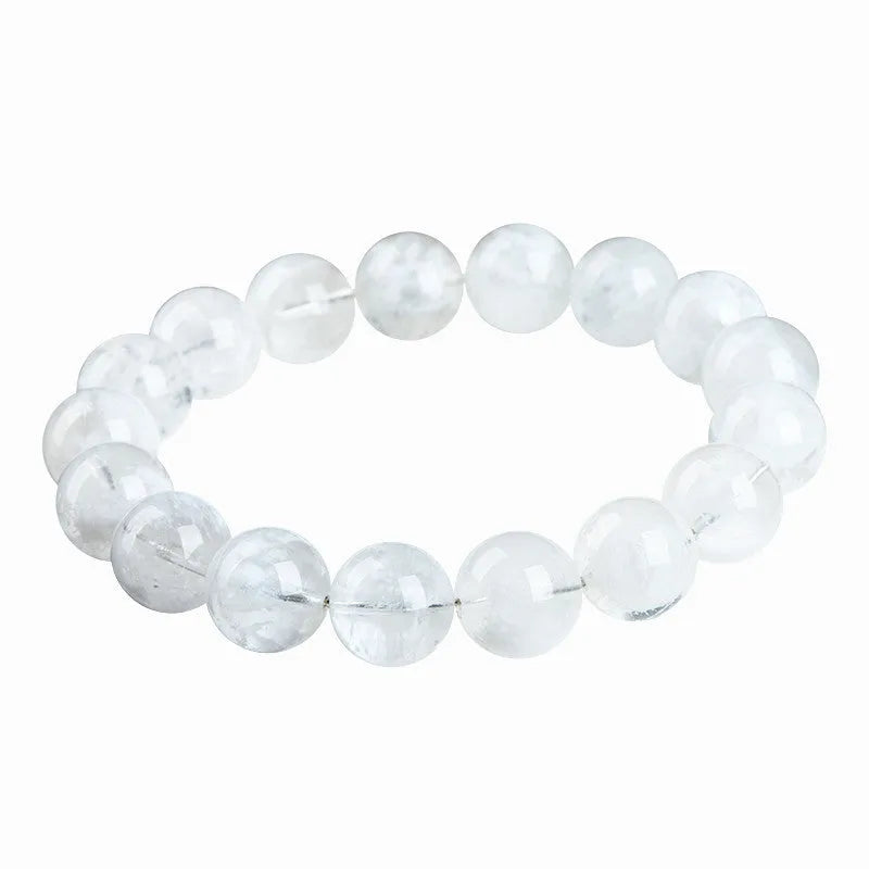 Natural blizzard snowflake crystal bracelet with round beads showing Ruyi and Xiangyun design elements