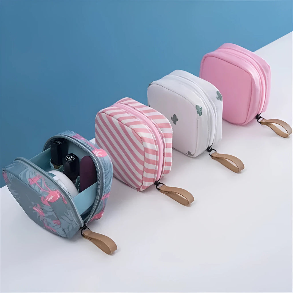 Cloth cube-shaped makeup storage bag in plain pattern available in blue, pink, white, and white pink colours