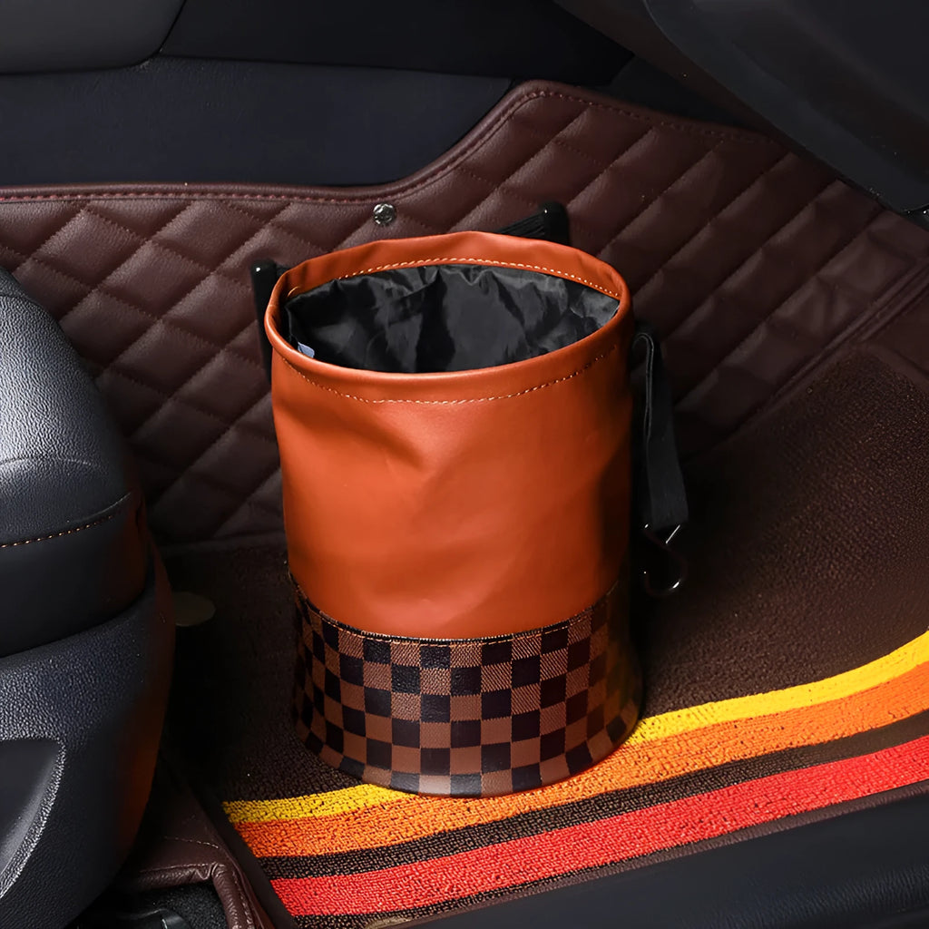 Black leather folding car bin with retractable handle and waterproof lining for vehicle waste collection