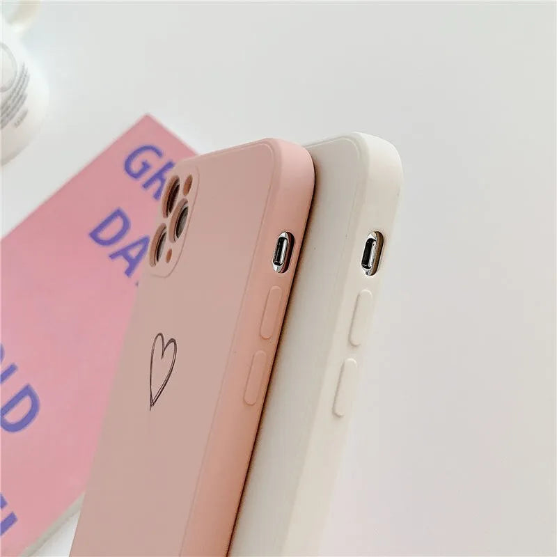 Solid colour silicone TPU phone case for Apple iPhone on a table.