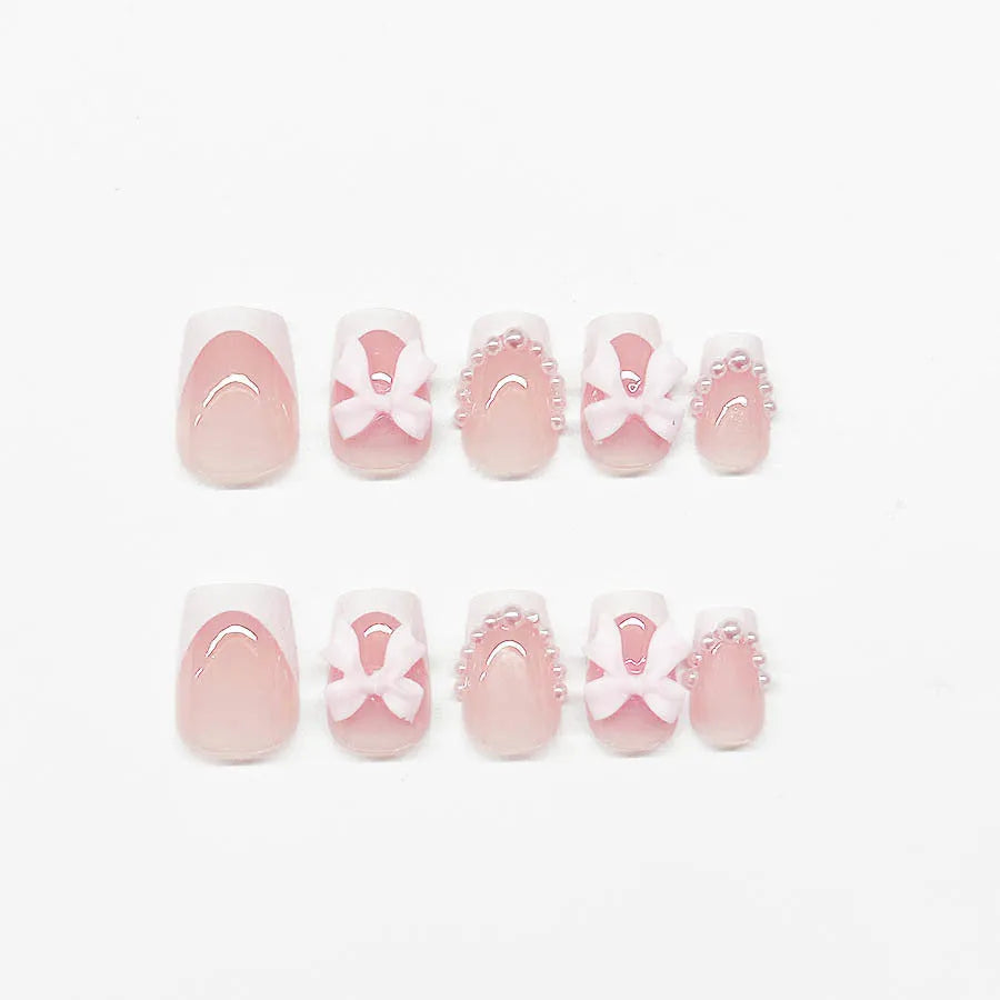 Nail art set with S274 glue showing French designs, bows, and leopard patterns for short square nails
