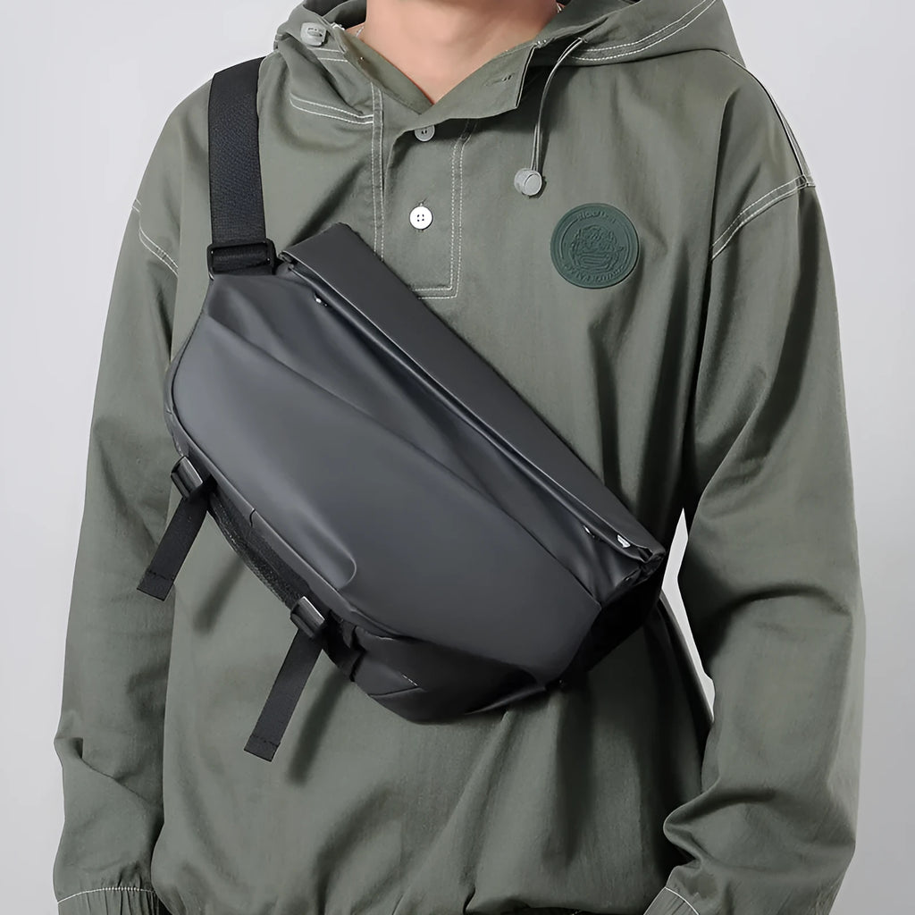 Grey PU crossbody bag showing shoulder strap and internal phone compartment