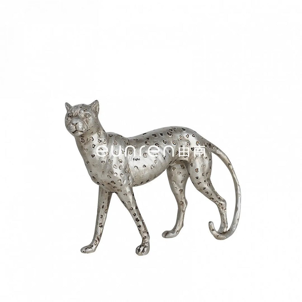Leopard resin ornament in American leopard colour with detailed spotted pattern