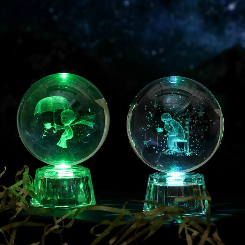 Transparent 6cm crystal ball ornament with inner carving on wooden table