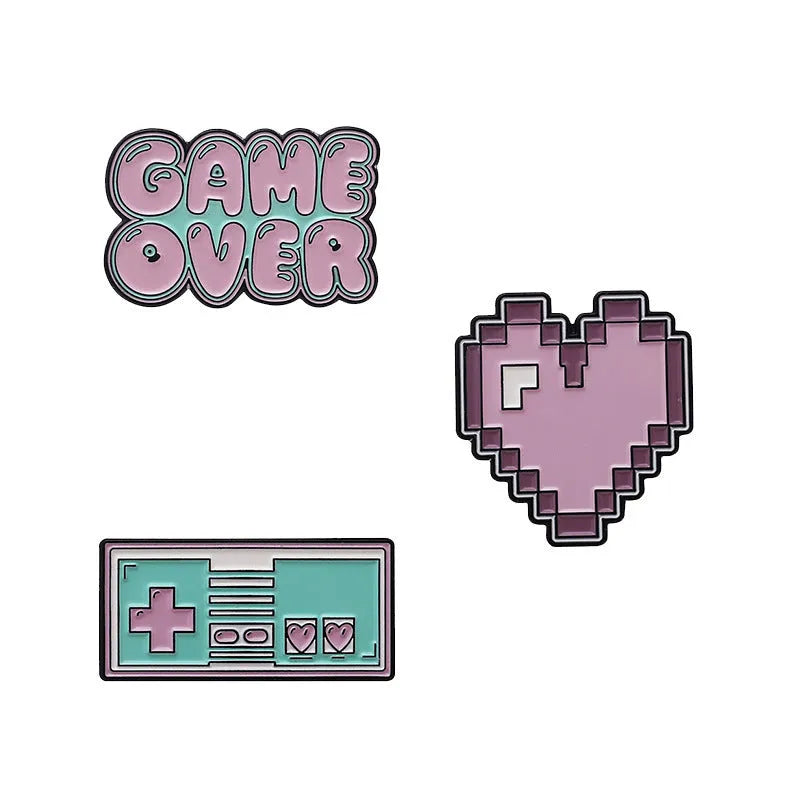 Stereo game console badge made from alloy, shown in one of three colour options with independent OPP packaging.