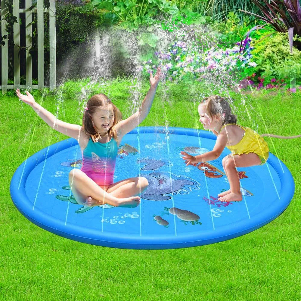 Blue children's water spray play mat with marine animal prints on grass