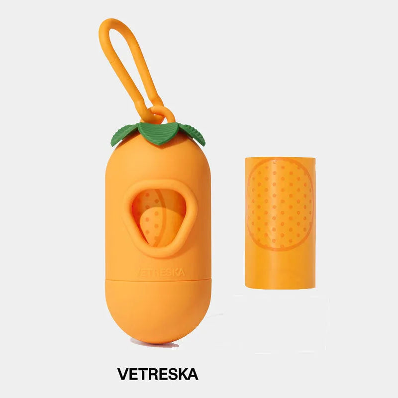 Portable dog waste bag dispenser capsule with scented inner bags in strawberry, orange, and cherry blossom options