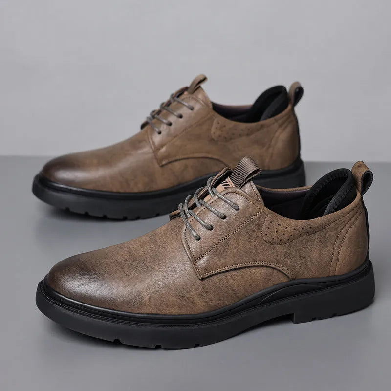 Men's black and brown leather sneaker with sewing line detail on a two-layer cowhide upper and rubber sole.