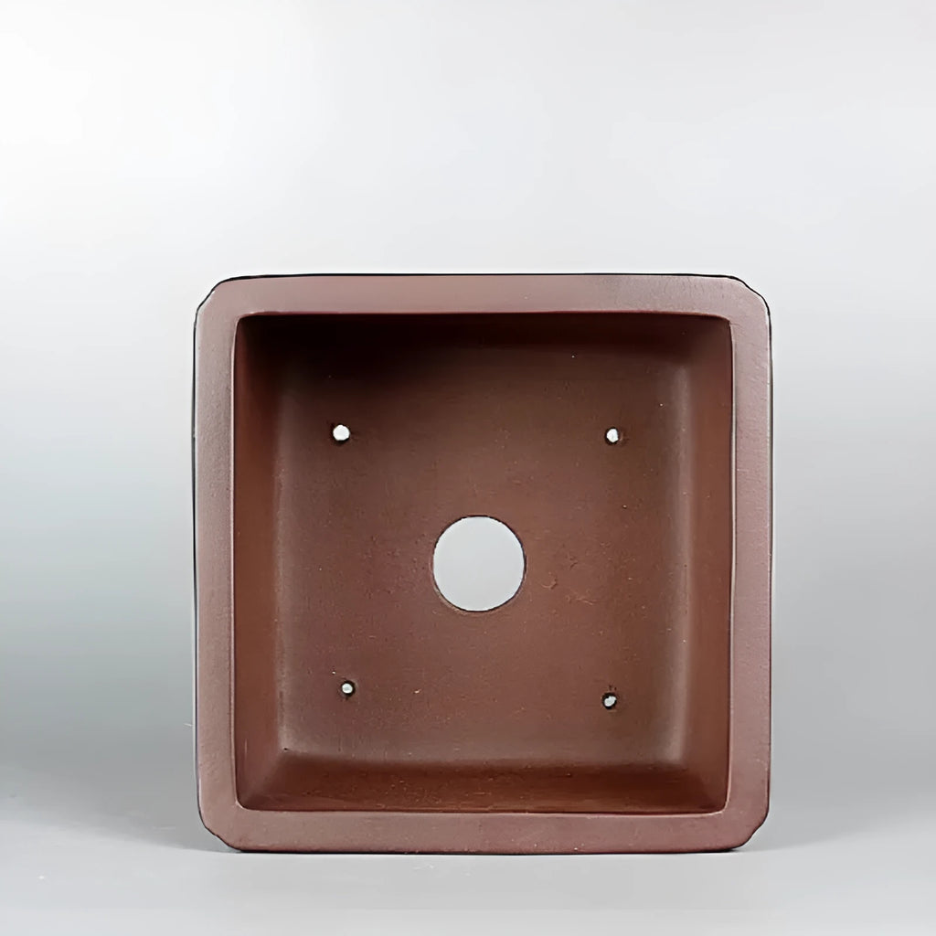 Brown handmade purple clay antique flower pot with classical design and single drainage hole