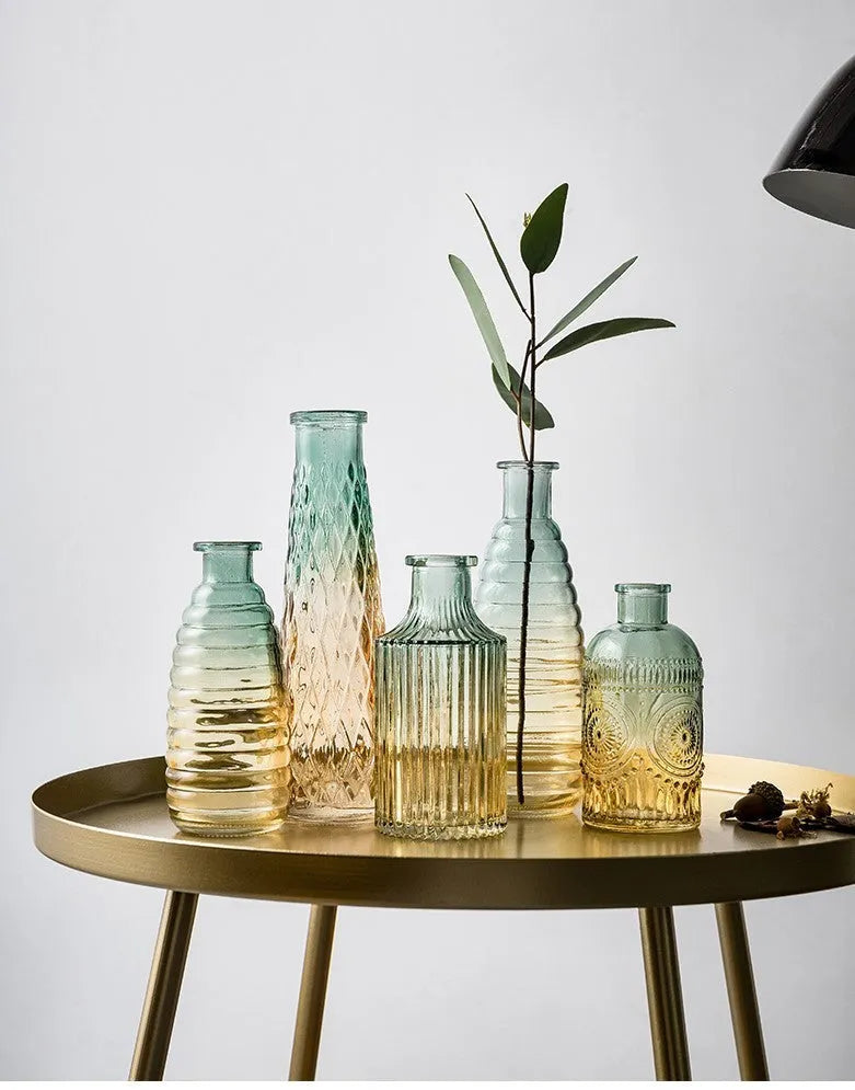 Electroplated colourful glass vase with thicker bottom, 7cm wide 22cm tall, on table