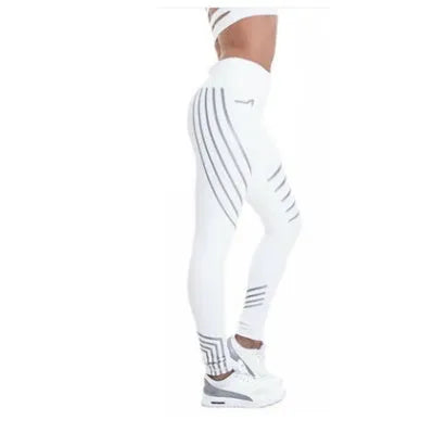 Women's black Milk Silk fitness leggings with night-glowing print, high-waisted pencil pants style.