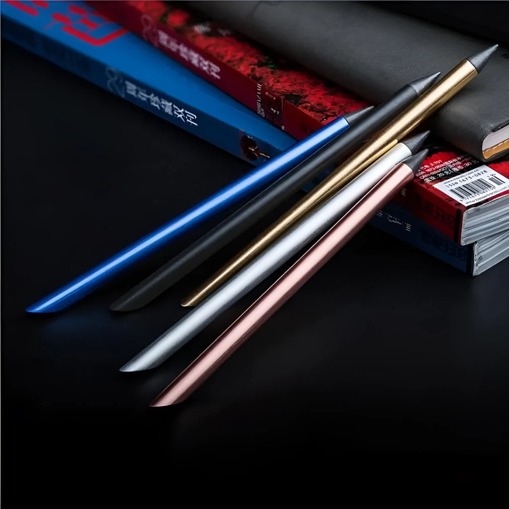 Silver inkless metal pen with alloy tip, spare nib, and presentation box on a desk.