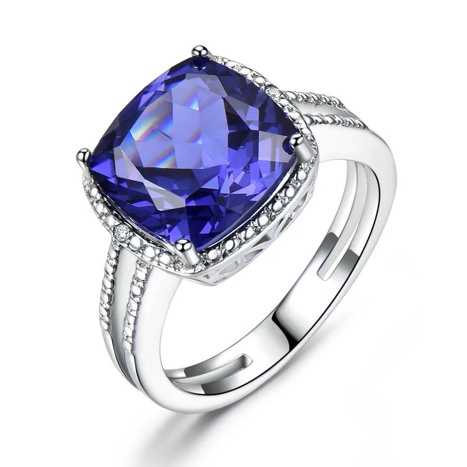 Blue tanzanite stone set in a sterling silver women's ring.