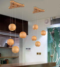 Nordic solid wood ball chandelier with adjustable height hanging cord