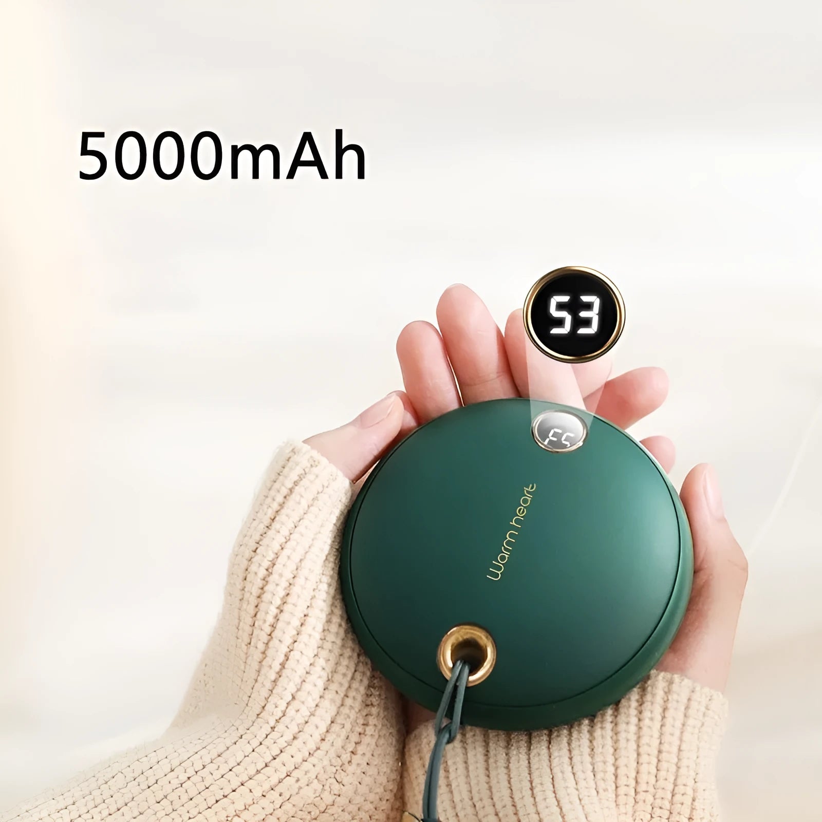 Green hand warmer power bank with digital display showing battery level, measuring 89.5mm square