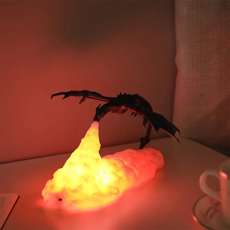 3D printed dragon-shaped night lamp with warm red glowing light effect on a dark background.