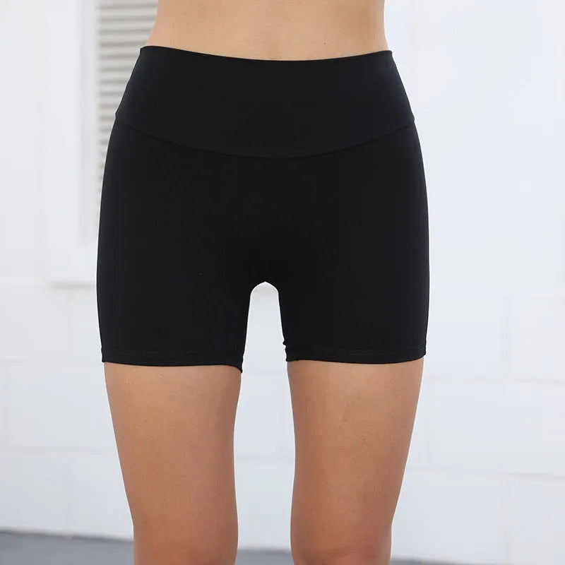 Women's high-waist fitness shorts with pockets in quick-dry nylon fabric, shown in Electric Blue colour