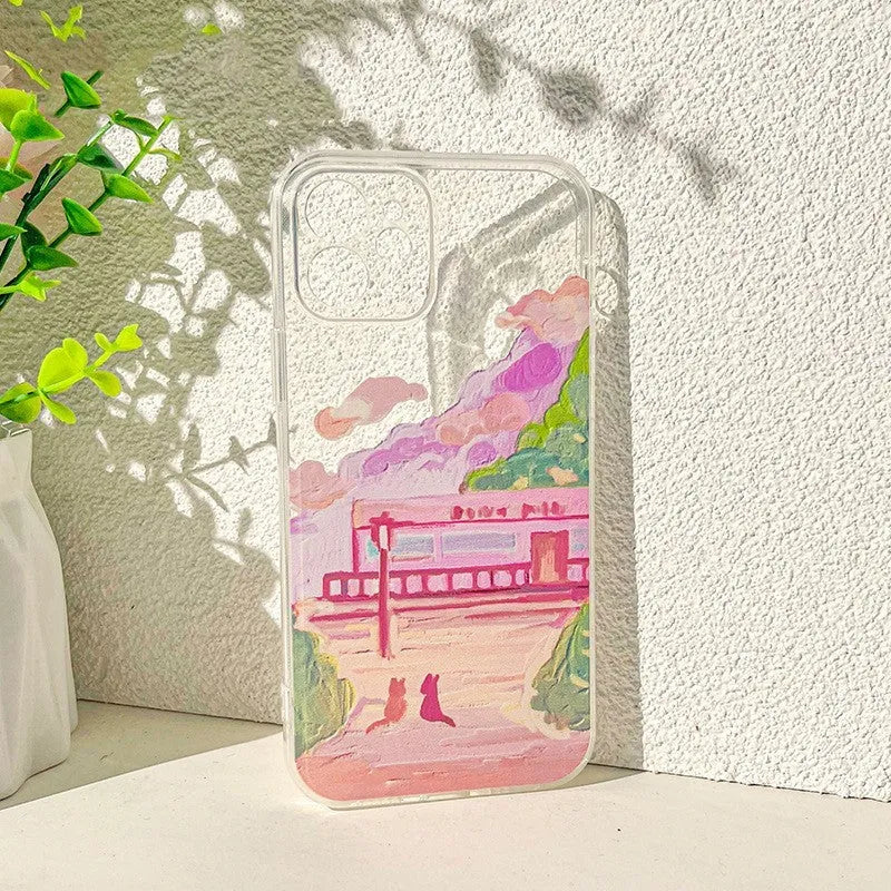 Soft silicone iPhone case with a colourful cartoon graphic of two cats on the back.
