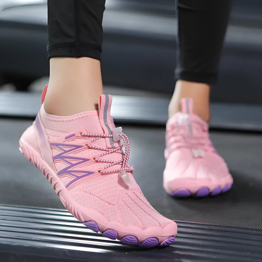 Lightweight low-top indoor fitness training sneakers in various colours with a non-slip rubber sole.