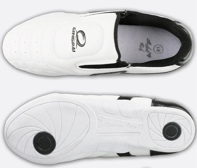 Black and white children's martial arts shoes with soft sole and widened fit for boxing training