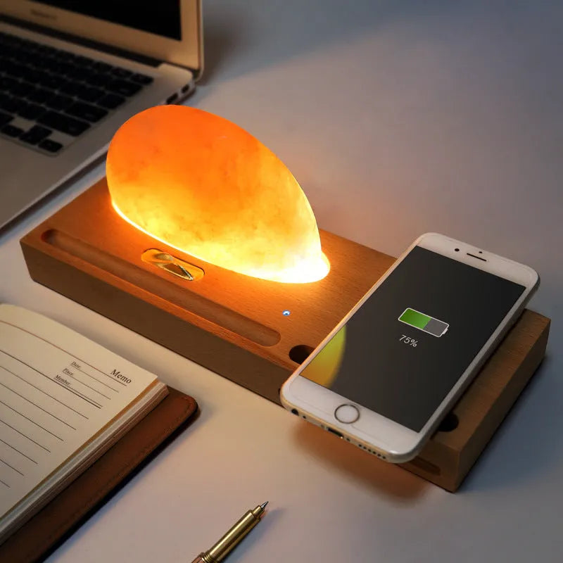 Sunrise Oriental wooden base table lamp with natural salt shade and built-in wireless phone charger.