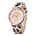 Quartz watch in leopard colour with analogue display on wrist