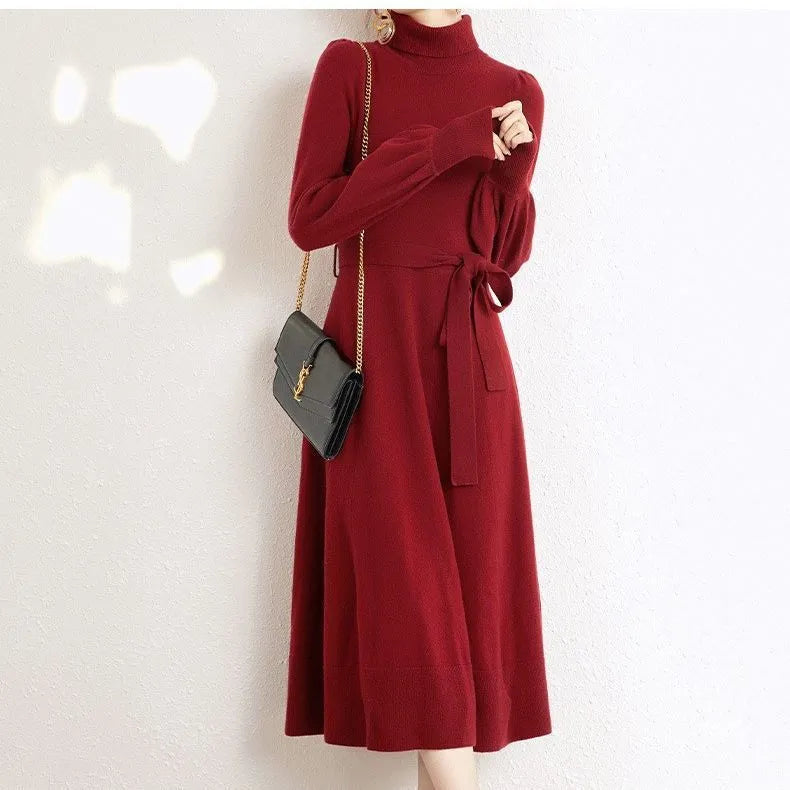 Turtleneck knit dress with elastic waist and loose hem in rose red colour