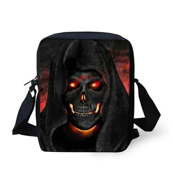 Medium-sized black children's messenger bag with a white skull pattern and double shoulder straps.