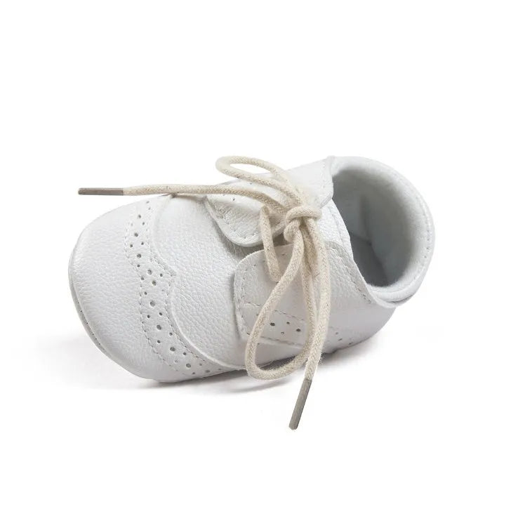 Vintage style baby soft sole walking shoes in synthetic leather available in multiple colours