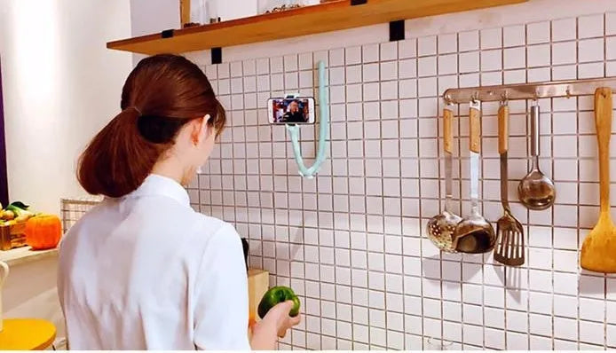 Lazy Bracket flexible mobile phone holder with suction cup mount extended to 62cm length showing 360° rotation mechanism