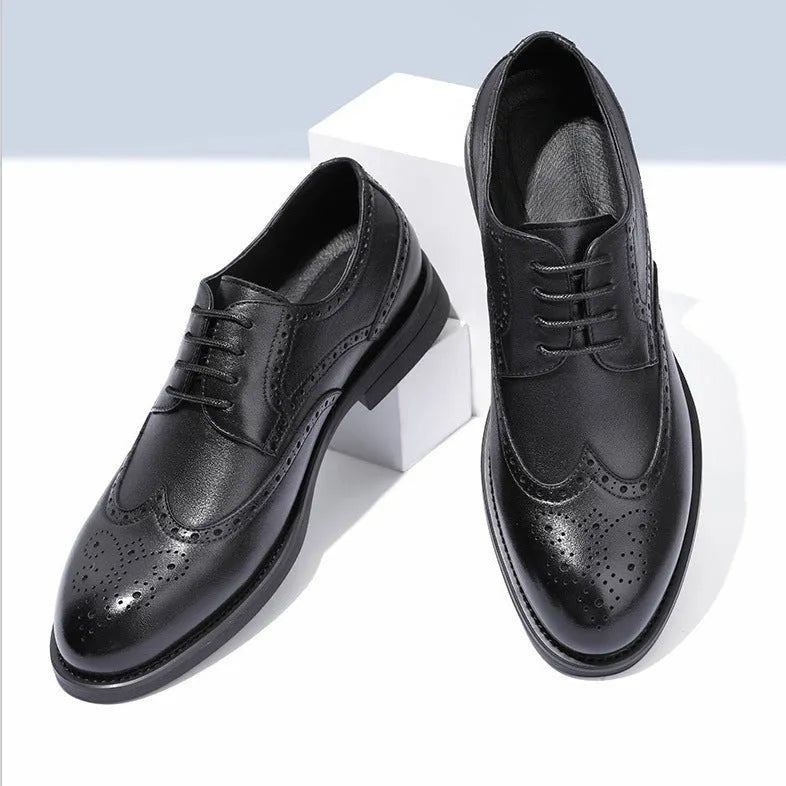 Men's black and brown brogue business shoes with classic detailing, shown from the side.