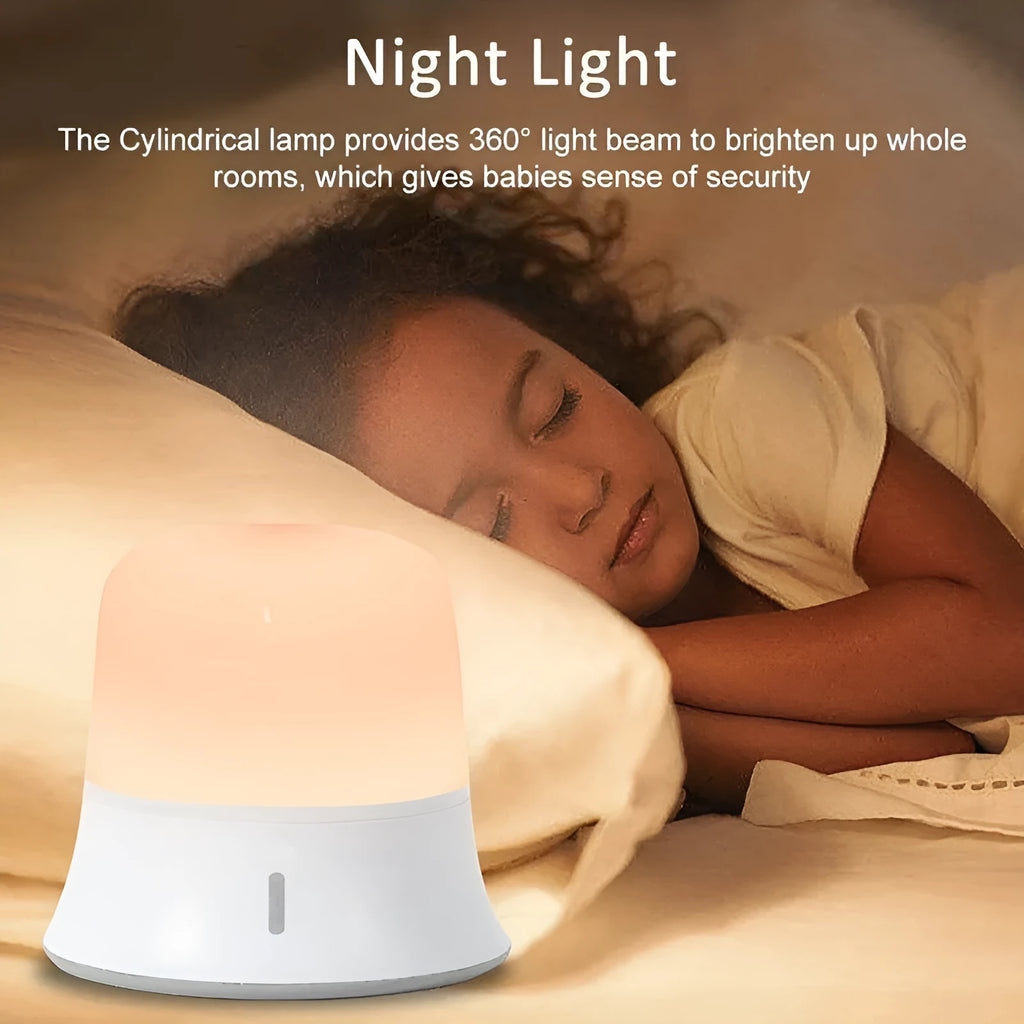 White cylindrical bedside night light with touch controls for dimming and colour changing
