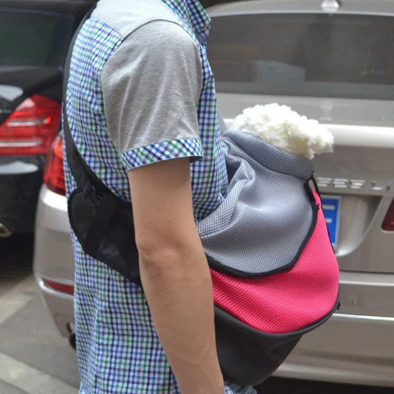 Pet backpack carrier in blue green red or purple with polyester PVC shell and foam lining for small dogs and cats