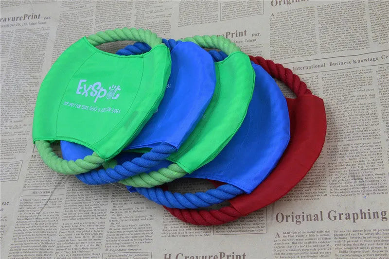 Canvas and rope pet dog flying disc toy with 19cm diameter on grass
