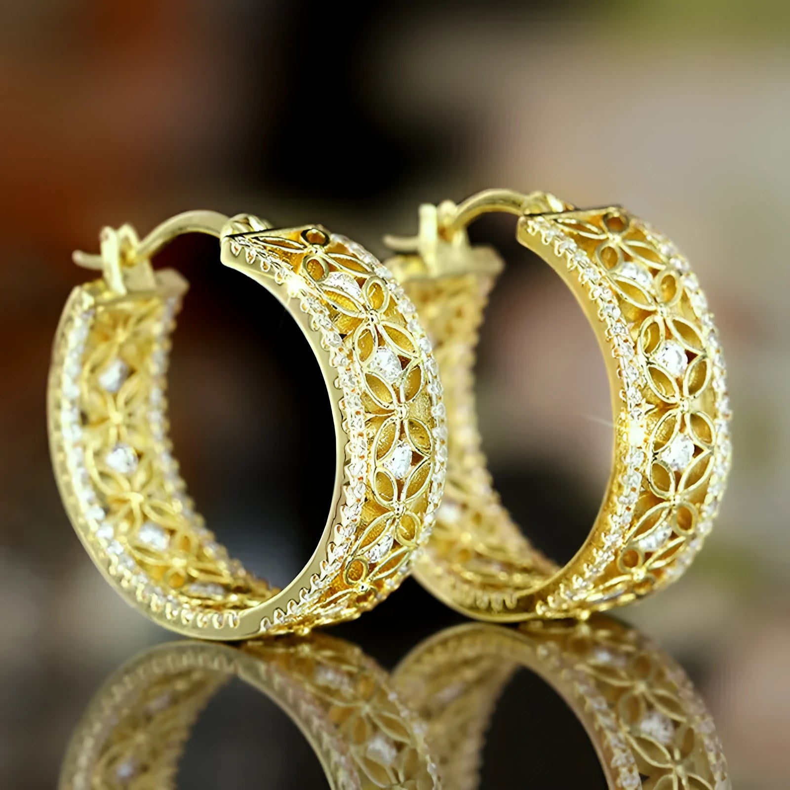 Geometric copper ear clips with horse, eye, flower and butterfly designs in yellow gold finish for women
