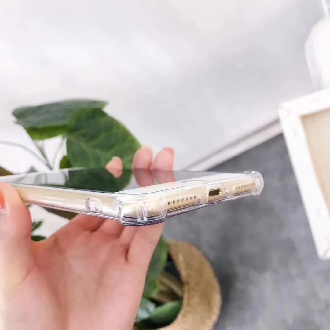 Transparent TPU protective case for iPhone showing phone's colour through clear back.