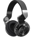 Blue String T2 black and white Bluetooth over-ear headset with folding metal design and detachable cable.