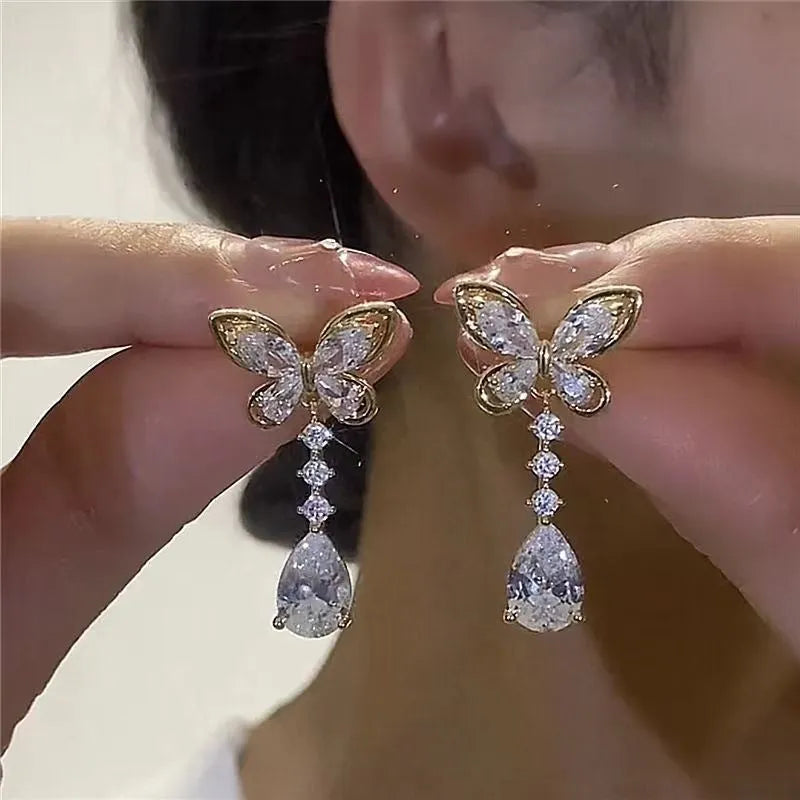 Platinum coloured bow stud earrings with electroplated finish on zinc alloy
