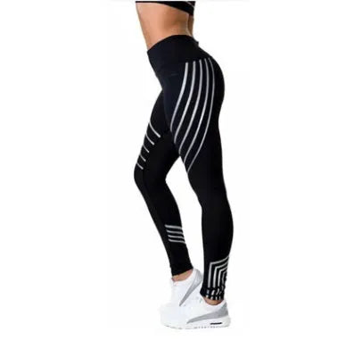 Women's black Milk Silk fitness leggings with night-glowing print, high-waisted pencil pants style.