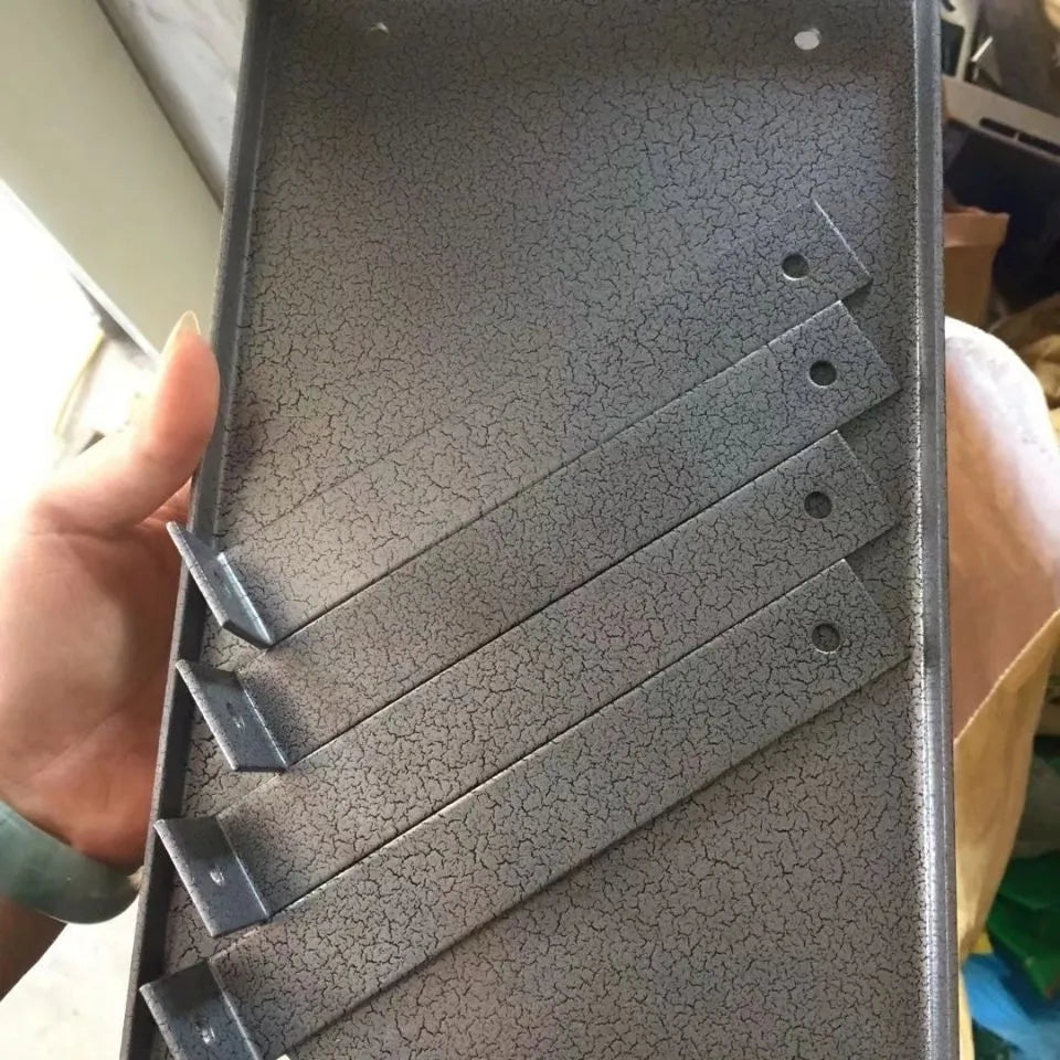 Black iron flip chip bracket for mounting a portable electric planer inverted.