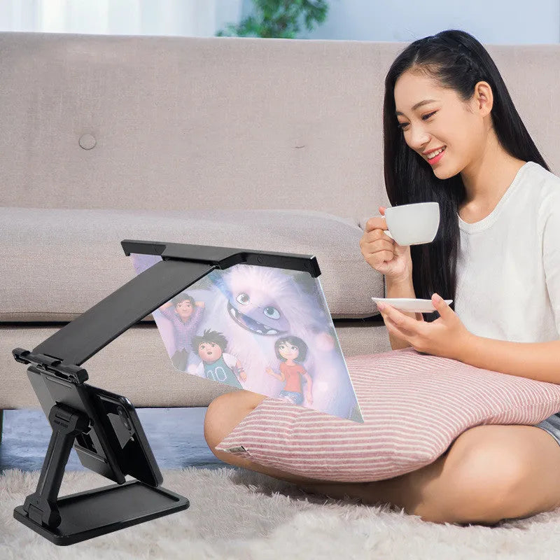Black L20 mobile phone screen magnifier with acrylic lens on a separate adjustable stand.